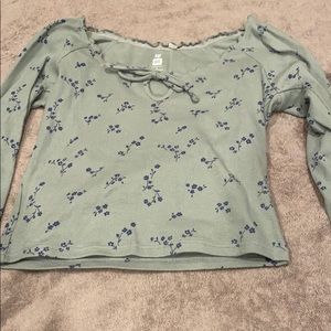 Cropped ruffled green and blue long sleeve.